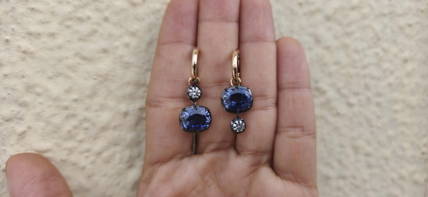 Women 4 stone asymmetric earrings, elongated cushion lab blue sapphire and cushion moissanite set in Georgian cut down button back setting.