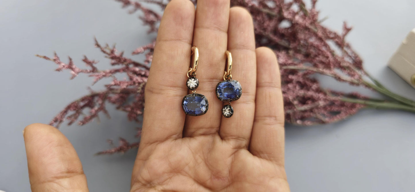 Women 4 stone asymmetric earrings, elongated cushion lab blue sapphire and cushion moissanite set in Georgian cut down button back setting.