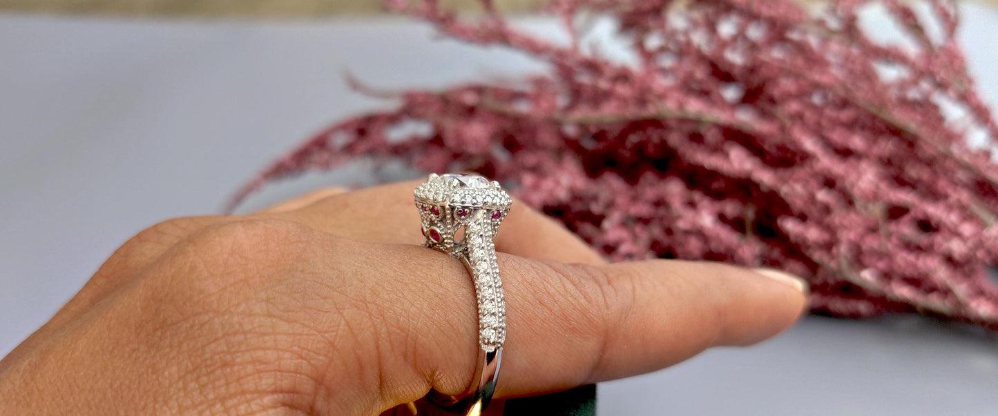 Vintage Cushion Cut Cathedral set Moissanite Double Halo double side pave milgrain pave basket with Lab rubies and and pave basket band.