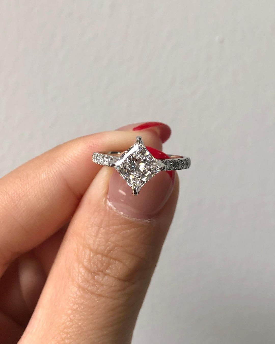 Vintage Compass pong Kite set Princess Cut moissanite with tulip basket and side pave solitaire Engagement ring, vintage-inspired setting.