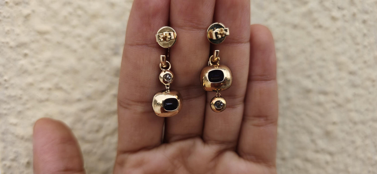 Women 4 stone asymmetric earrings, elongated cushion lab blue sapphire and cushion moissanite set in Georgian cut down button back setting.
