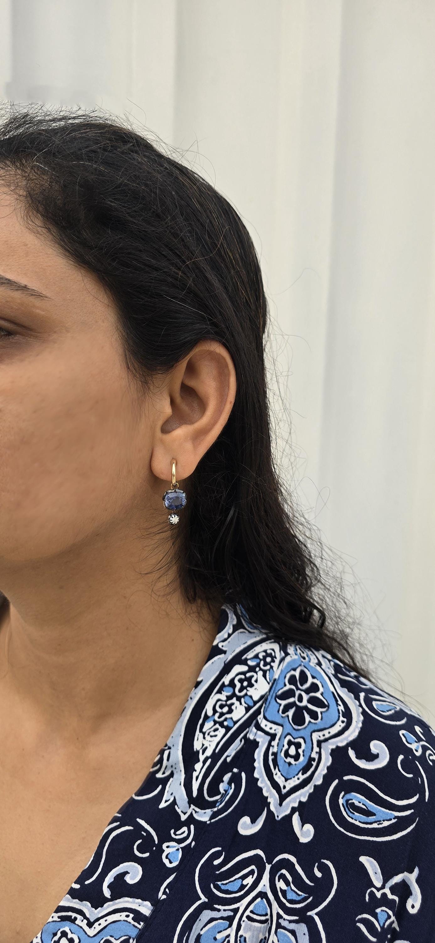 Women 4 stone asymmetric earrings, elongated cushion lab blue sapphire and cushion moissanite set in Georgian cut down button back setting.