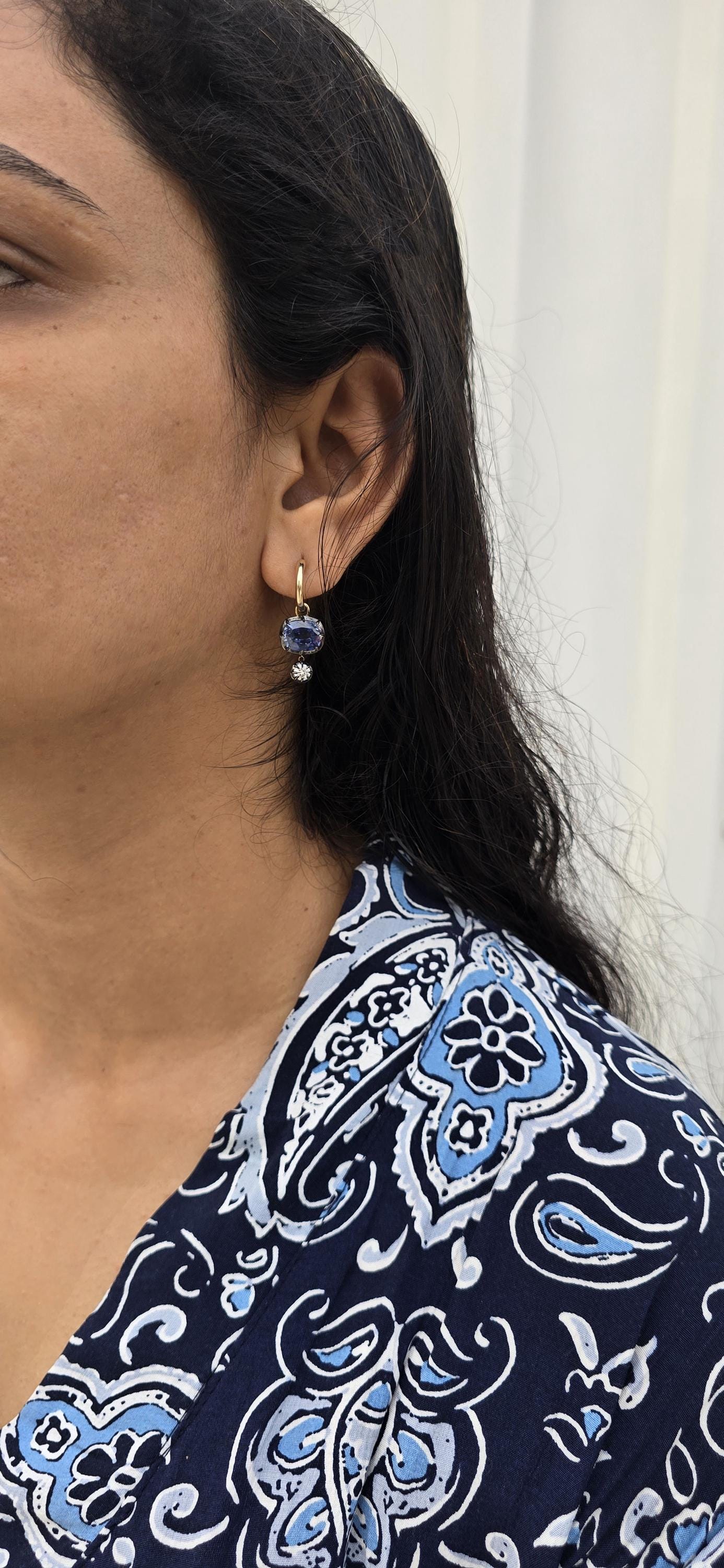 Women 4 stone asymmetric earrings, elongated cushion lab blue sapphire and cushion moissanite set in Georgian cut down button back setting.