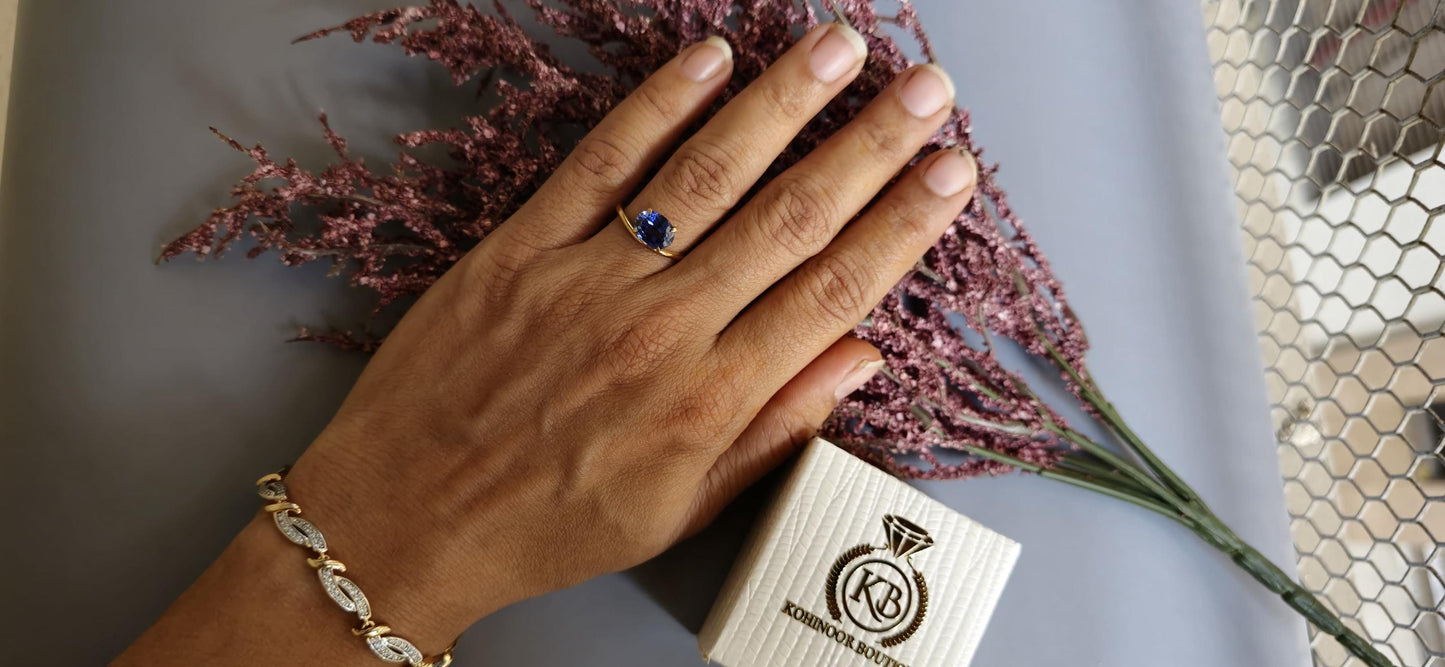 East West  set Corn flower Blue sapphire oval Cut with floating setting ring