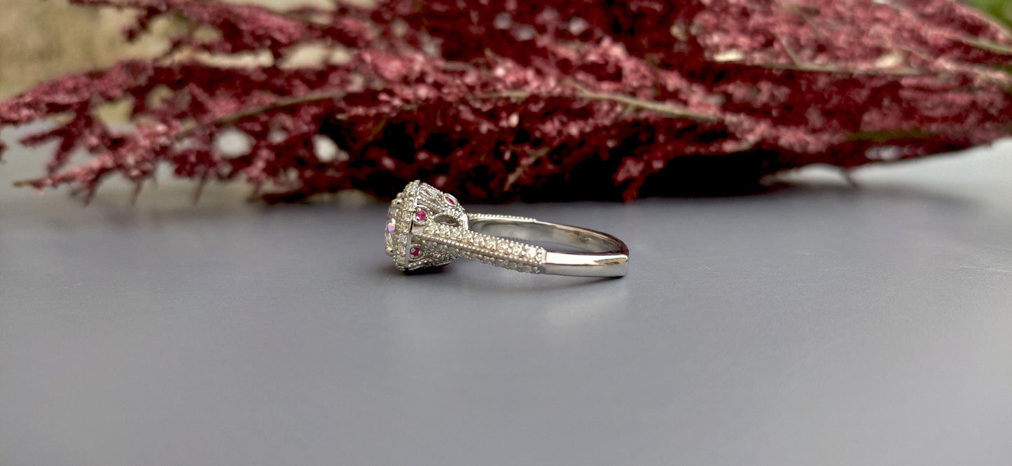Vintage Cushion Cut Cathedral set Moissanite Double Halo double side pave milgrain pave basket with Lab rubies and and pave basket band.
