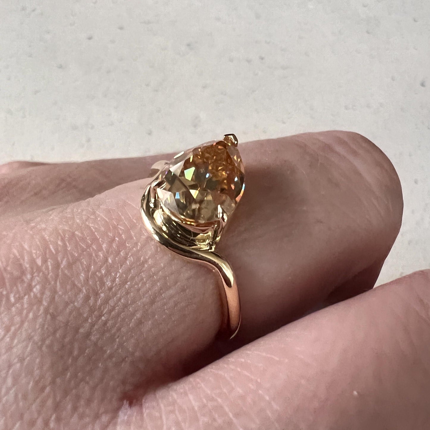 Tilted Floating Old Mine Antique Champagne Pear Cut Moissanite Engagement Ring.