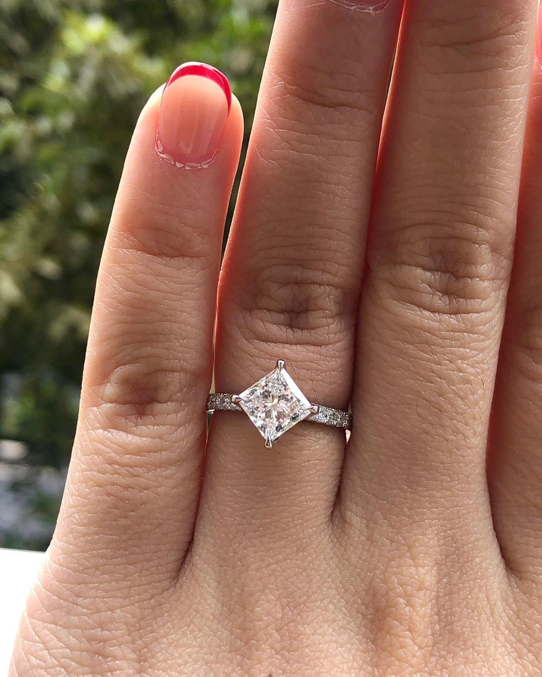 Vintage Compass pong Kite set Princess Cut moissanite with tulip basket and side pave solitaire Engagement ring, vintage-inspired setting.