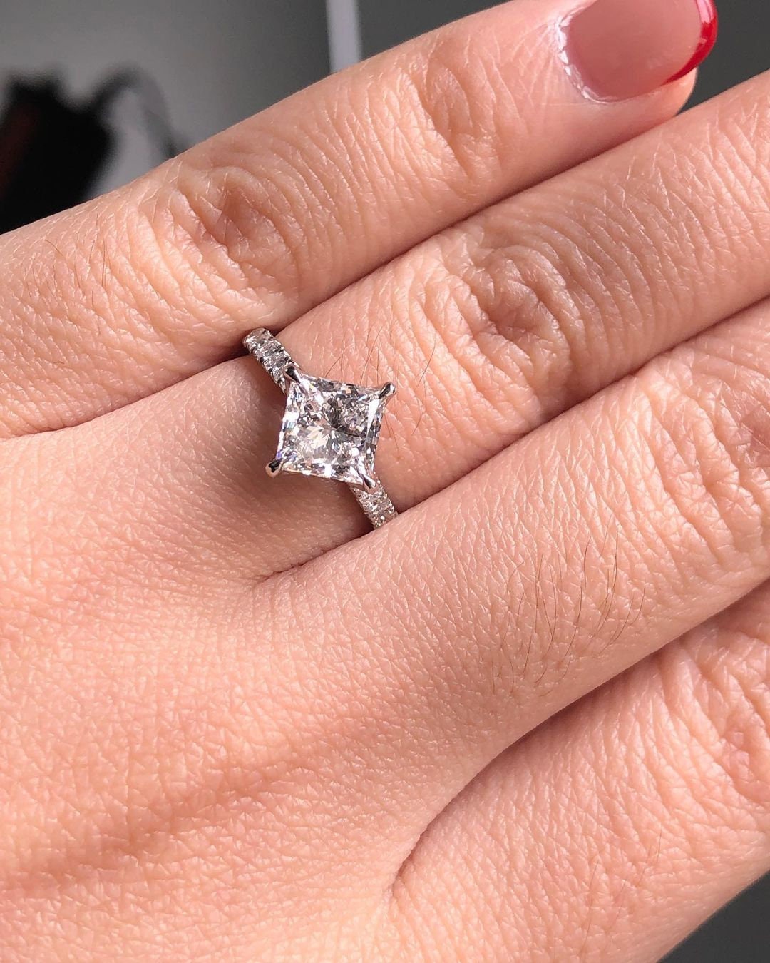 Vintage Compass pong Kite set Princess Cut moissanite with tulip basket and side pave solitaire Engagement ring, vintage-inspired setting.