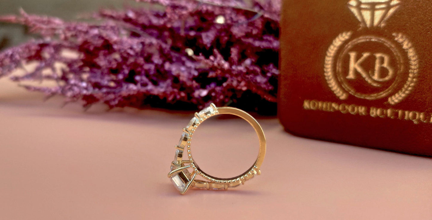 Emerald Cut Moissanite Solitaire Engagement Ring with Side east-west set Marquise, Unique Cathedral setting and millegrain detail.