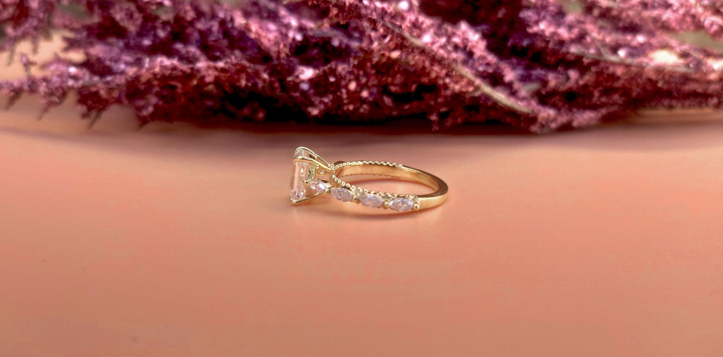 Emerald Cut Moissanite Solitaire Engagement Ring with Side east-west set Marquise, Unique Cathedral setting and millegrain detail.