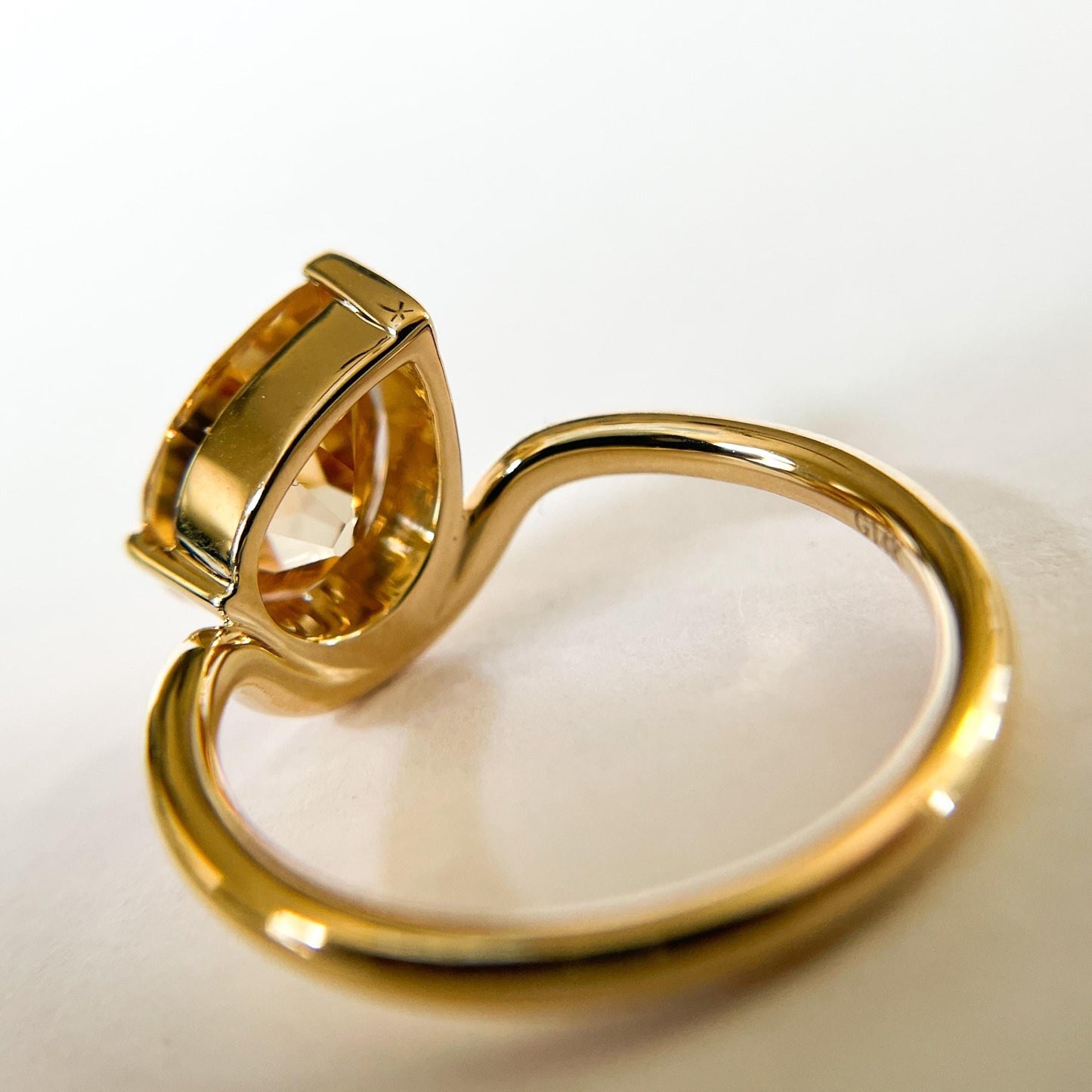 Tilted Floating Old Mine Antique Champagne Pear Cut Moissanite Engagement Ring.